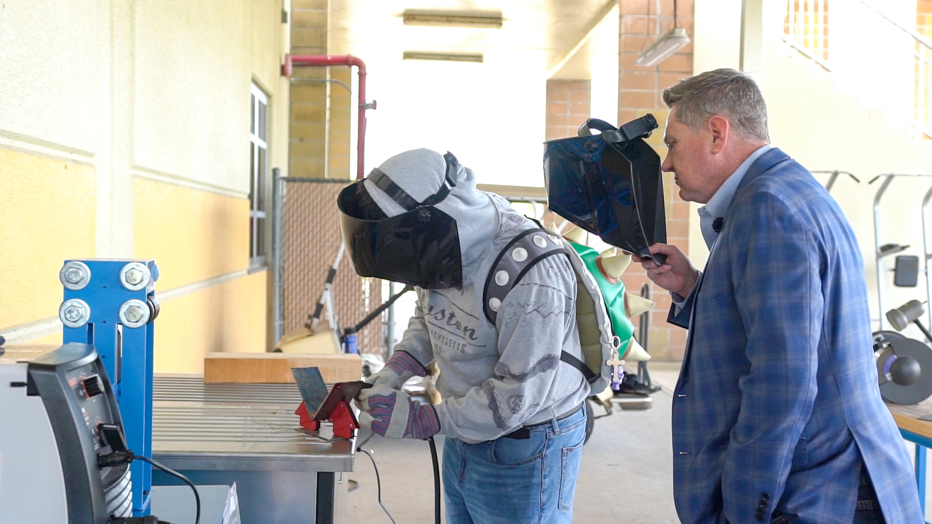 Liberty High School student and Osceola County Commission Chair Brandon Arrington in Liberty's new Career and Technical Education Manufacturing Lab, which was paid for by Osceola County Board of County Commissioners 